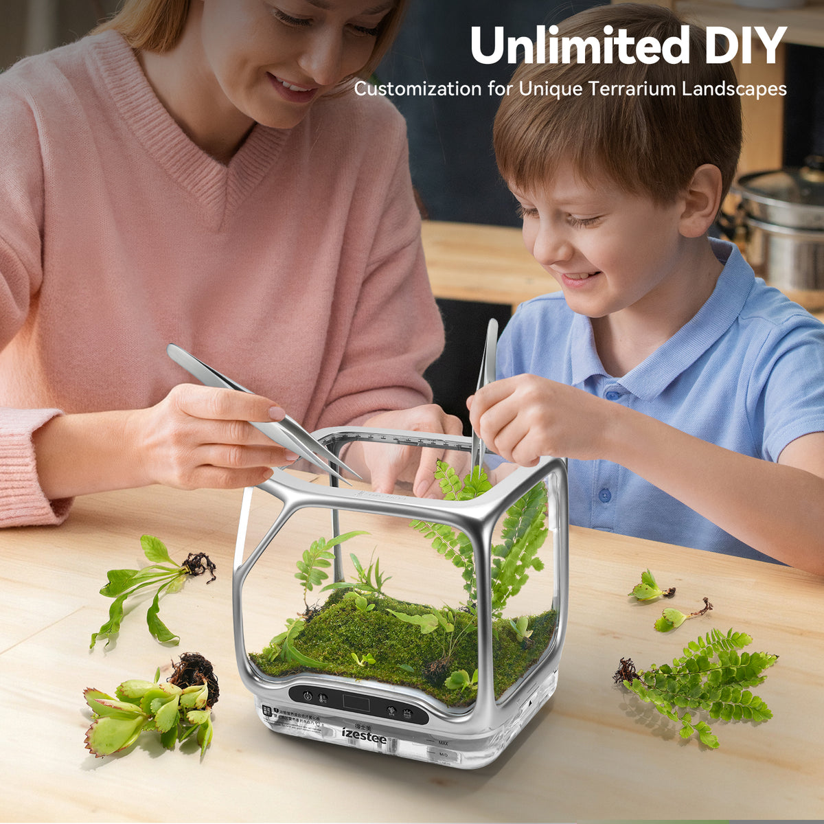 Parent and child building a DIY moss terrarium miniature landscape with tweezers, indoor garden craft kit for adults and kids