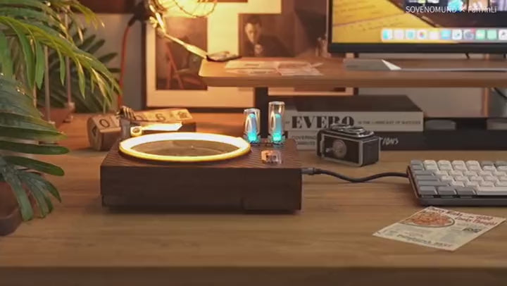 Video: the retro tabletop water fountain running — real water droplets fall onto the spiral disc while the RGB ambient light shifts, with soft white noise sound