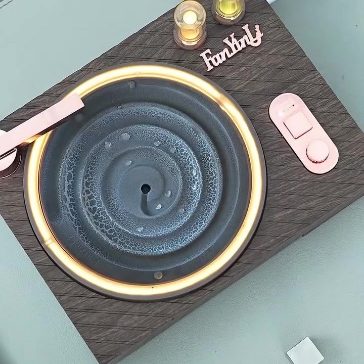 Retro water drop ambient player top view warm ring light